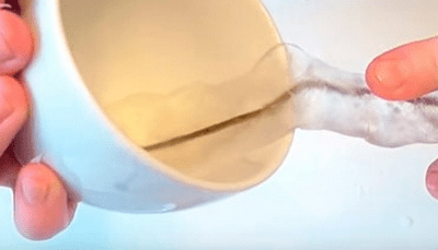 Cup mounted on a plastic base