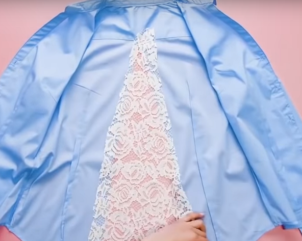 Sewing the lace insert into the back of the blouse