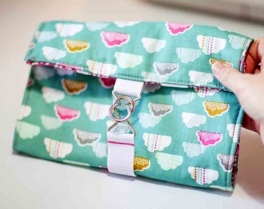 Closed fabric cable organizer with a strap