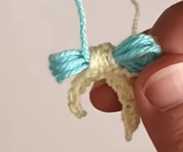 Bow blank with blue loops and light-colored tails