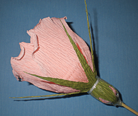Finished rosebud on a skewer with a green sepal