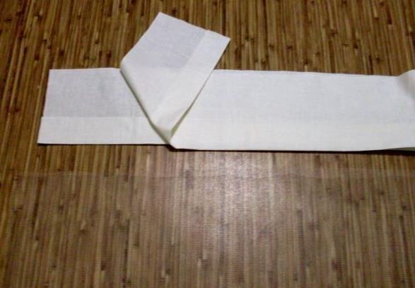 White cotton strips prepared for the petticoat yoke