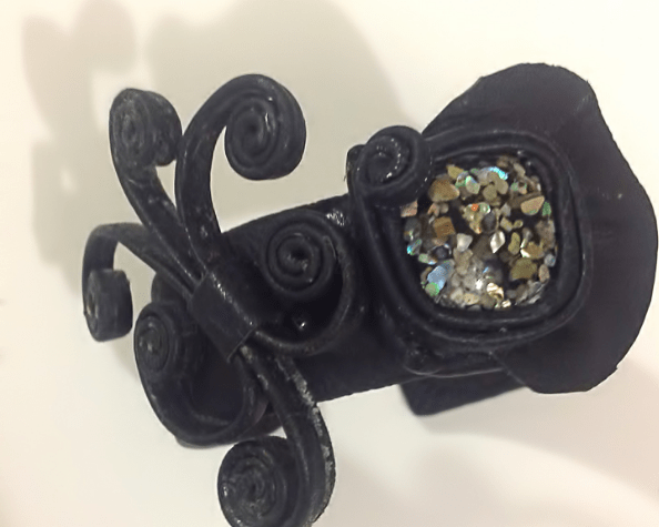 Large decorative element of the leather jewelry set