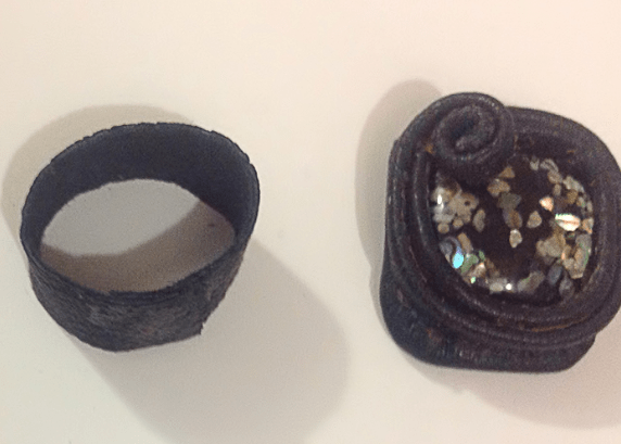 Wide leather bracelet and central leather element