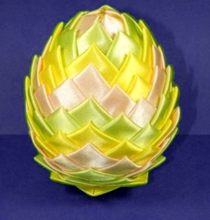Finished Christmas pinecone made from satin ribbons