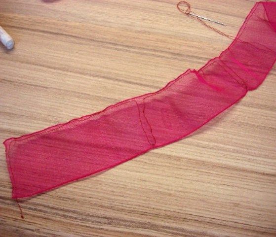 Organza ribbon after running stitches along its full length