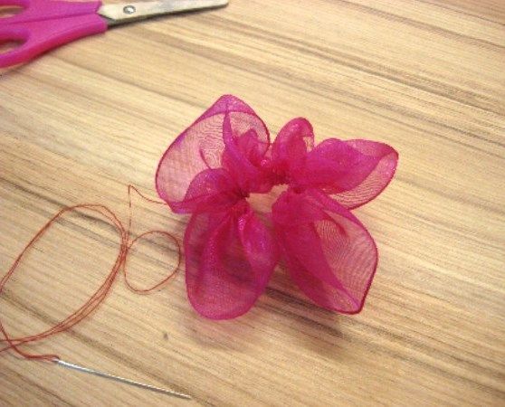 Gathered organza shaped into a flower without stamens