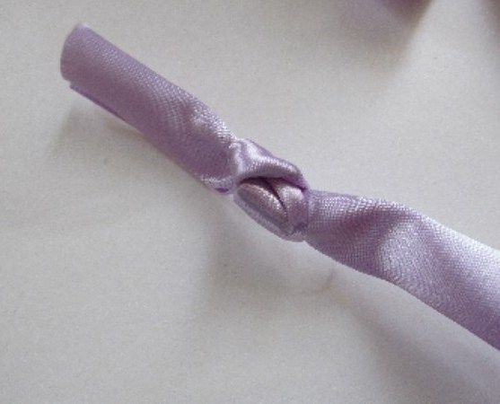 Lilac ribbon center wrap with a knot