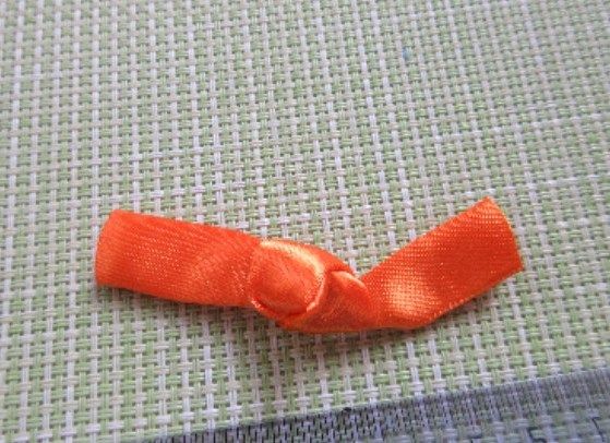 Orange center ribbon tied in a knot