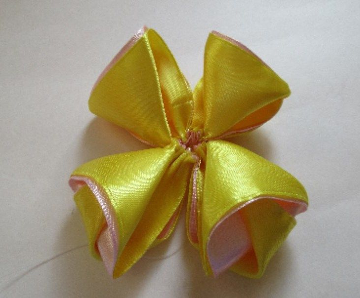 Finished satin bow with a center wrap