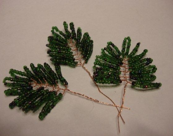 Finished beaded branches in different sizes for assembly