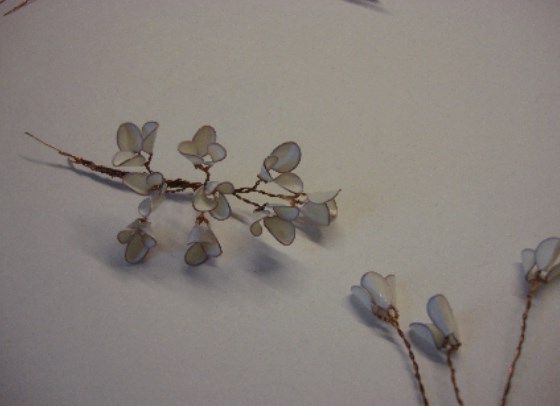 Branch and separate wire-and-nail-polish flowers
