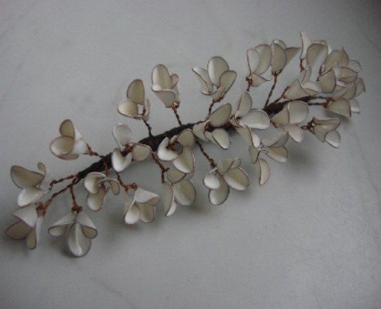 Finished white-flower branch for a hair ornament