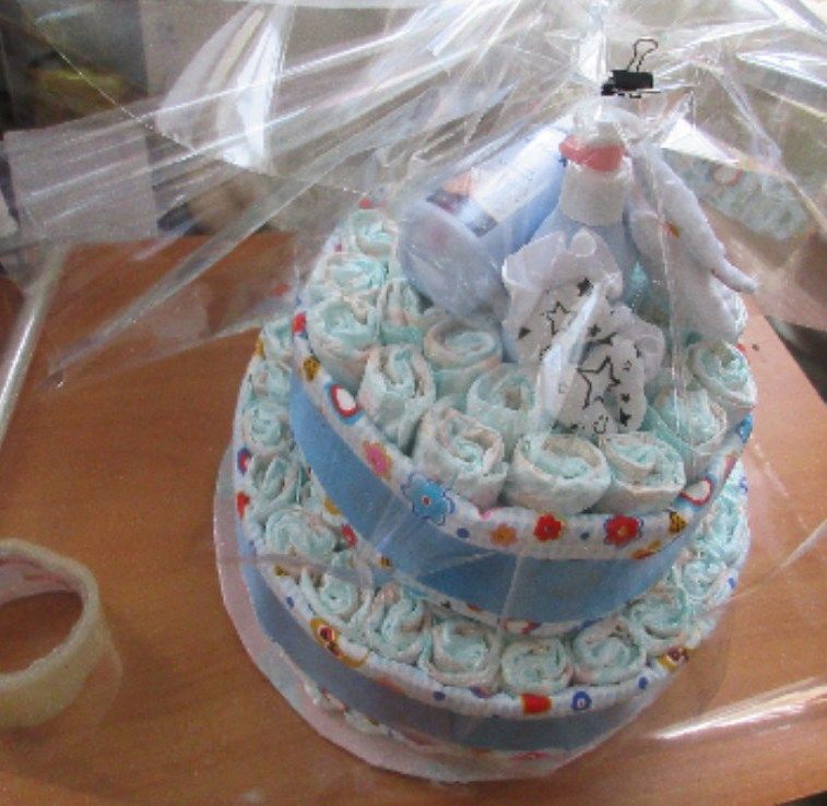 Diaper cake wrapped with a bow
