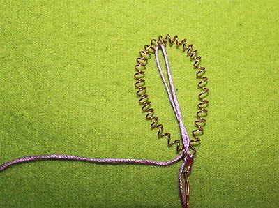 Beginning to wind the thread onto the wire petal frame