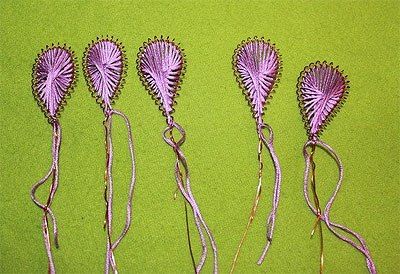 Several finished petals ready for flower assembly