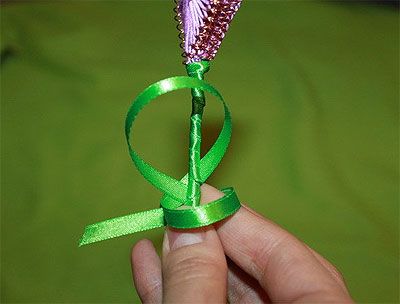 Finished ribbon leaf on the flower stem