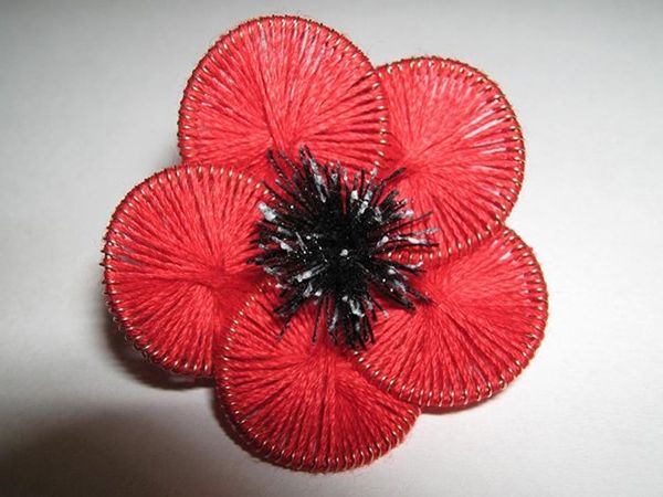 Thread poppy flower with a black center