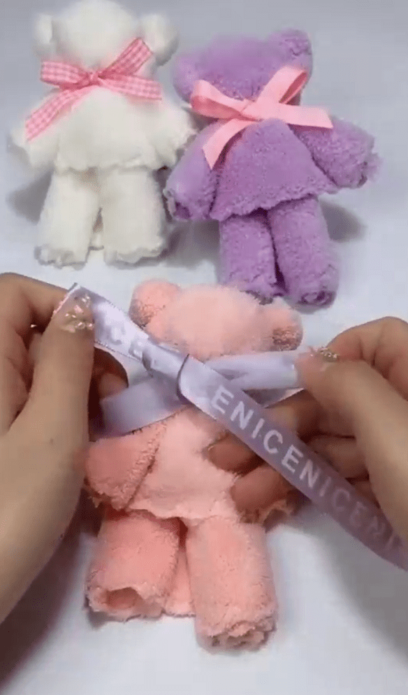 Finished towel bear with ribbon bow