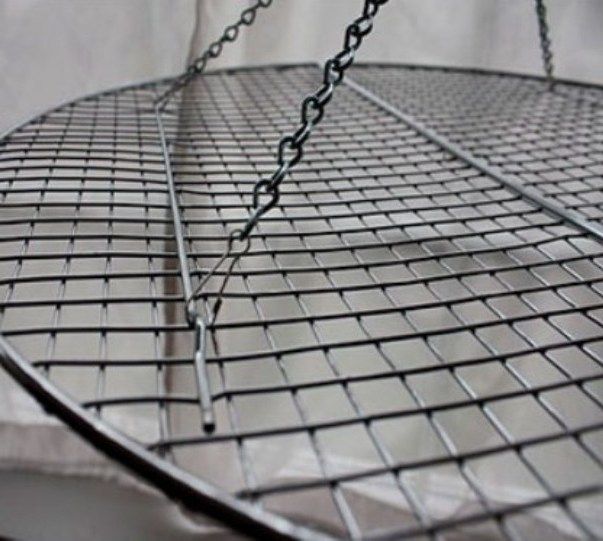 Metal grid base for a suspended Christmas tree
