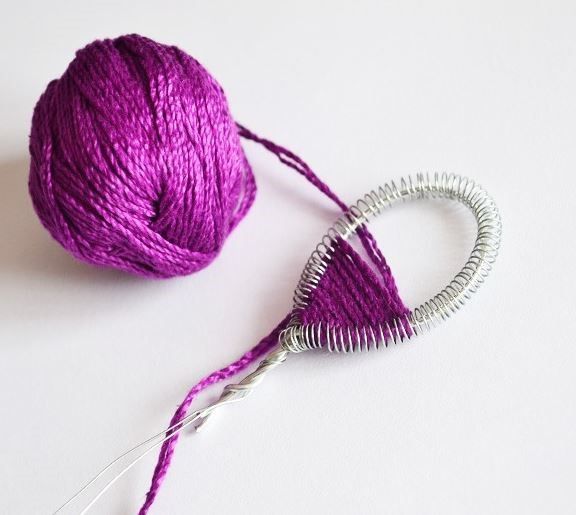 Wrapping the wire petal frame with lilac thread