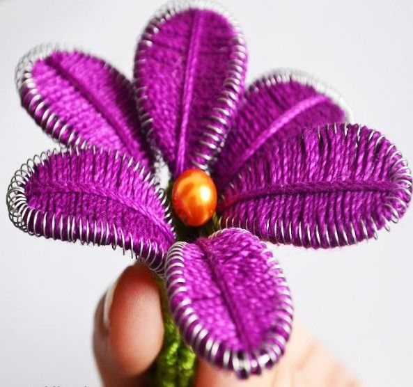 Finished ganutell flower with a bead in the center