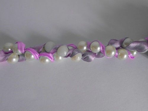 Twisting the bead strands together