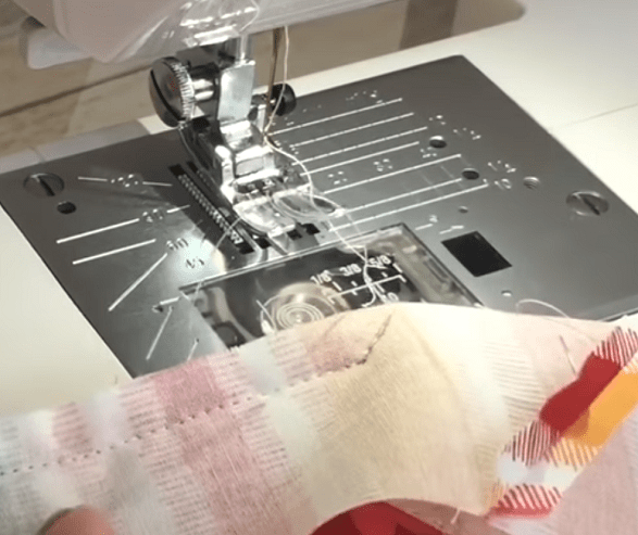 Binding stitched to the corner of a patchwork project