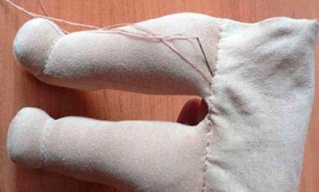 Sewn legs of a Waldorf doll with seam lines