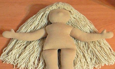 Waldorf doll with long yarn hair