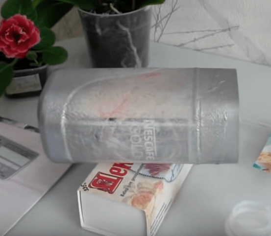 Jar coated with light-colored spray paint