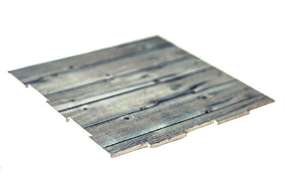 Flat cardboard backdrop panel covered with a wood-plank texture