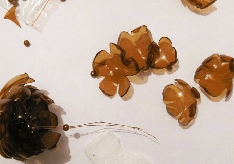 Beaded tail attached to the base of the pinecone ornament