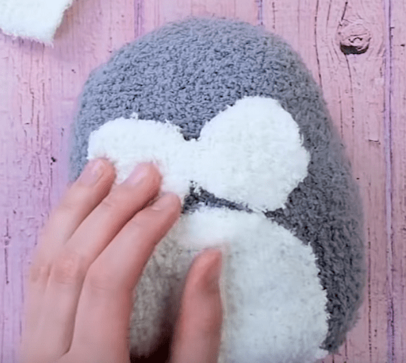 White insert on the penguin toy's belly